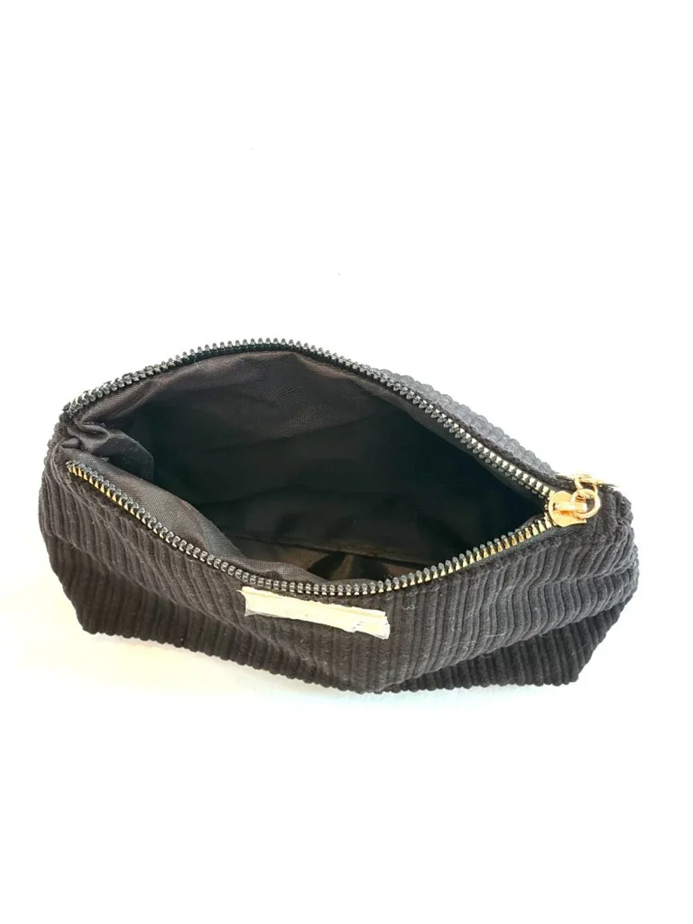 Laura Geller cosmetics bag black